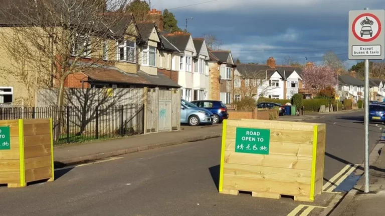 Photo of planter pots and no vehicle sign at entrance to Oxford LTN