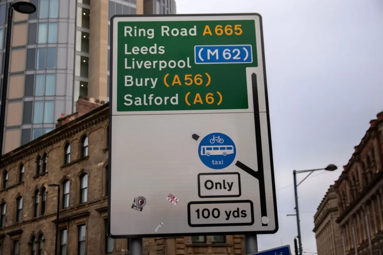 Photo of street sign showing exit from A road is only for buses