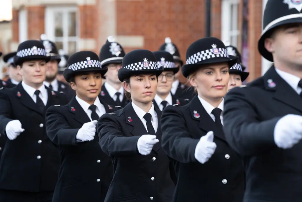 Photo of police officers marching